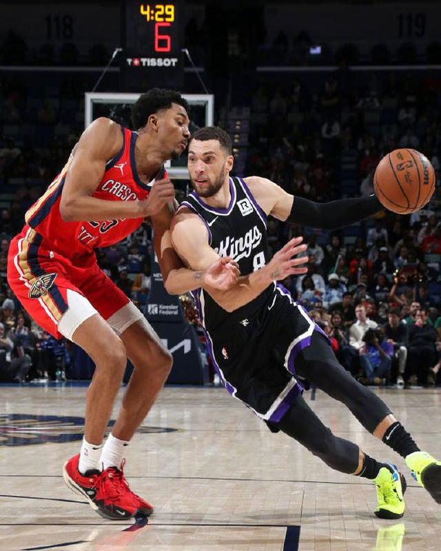 九游app下载-篮板球争夺激烈，鹈鹕队险胜对手